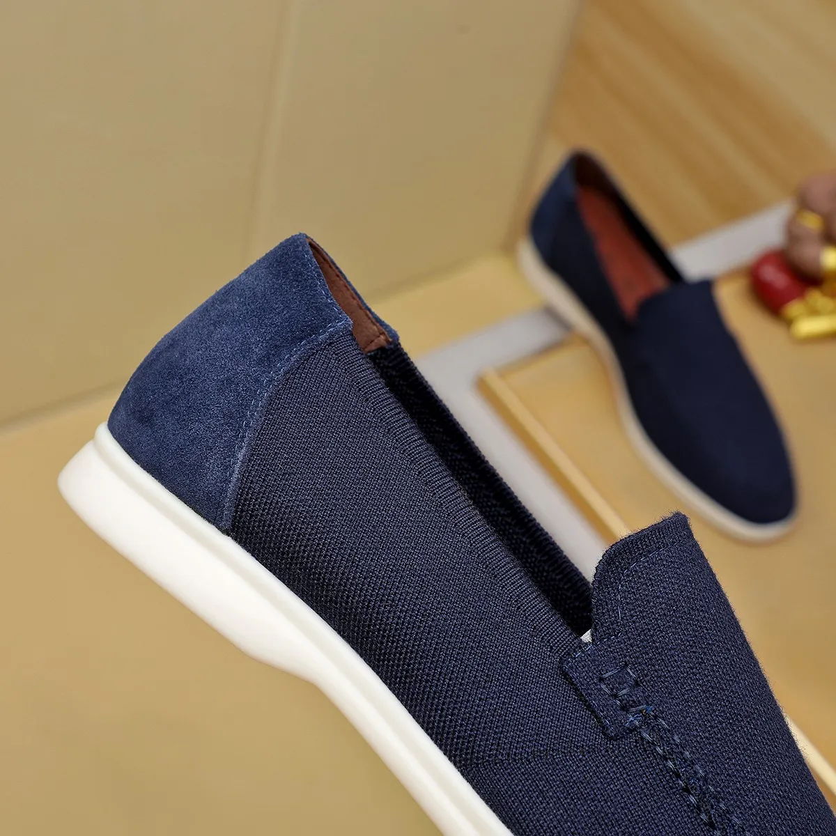 Men's Men's Shoes 💰 400 Loro PIana moccasin made of wish wool fabric. The upper is made of knitted fabric, made on a loom, and then attached to a rubber sole. The Rain System's water-repellent treatment enhances the shoe's functional design, while the suede details give the shoe a sense of elegance and sophistication. Made from Wish, fine wool from Australian and New Zealand Merino sheep 38-44